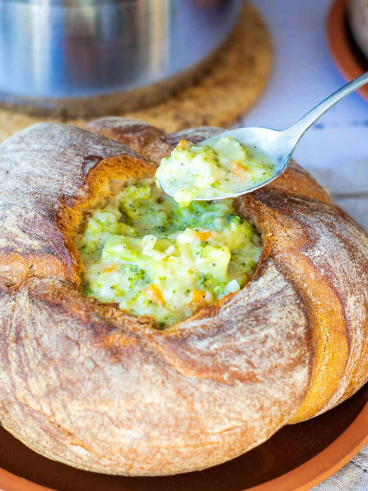 Broccoli cheddar soup served in a sourdough bread bowl.