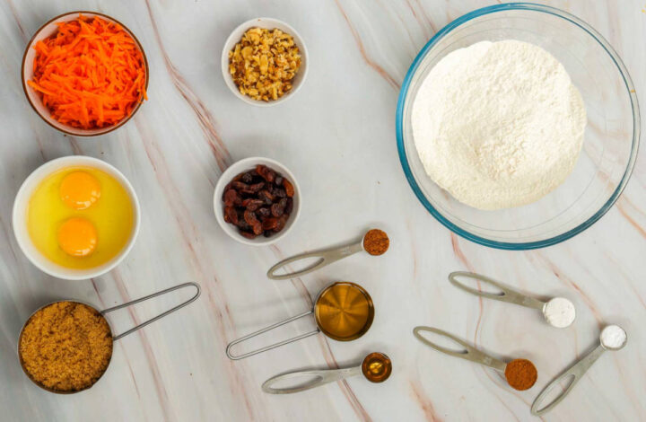Ingredients placed on a brown marble surface.