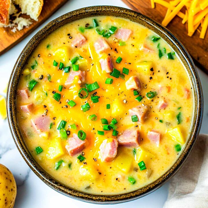 A bowl of creamy ham and potato soup.