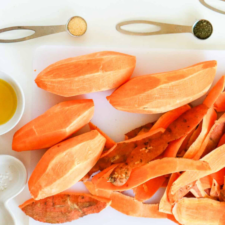 Sweet potatoes peeled and ready to be cut into fries shape.