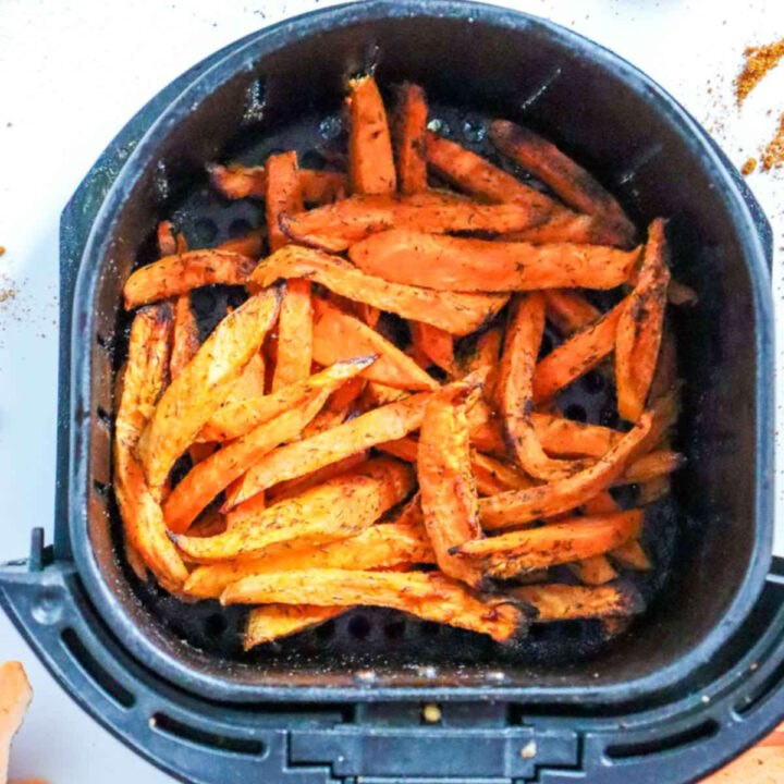 Crunchy air fried sweet potato fries in the basket.