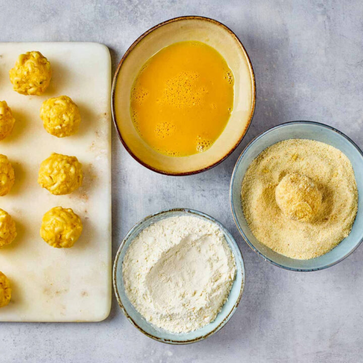 A ball of mac and cheese rolled in bread crumbs.