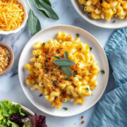 Close-up plated pumpkin sage mac and cheese with sage and breadcrumbs.