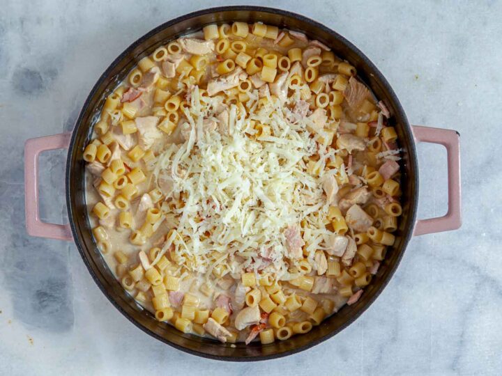 Add pasta, reduce heat to a steady simmer, and cover. Cook for 10–12 minutes, stirring occasionally, until pasta is al dente.