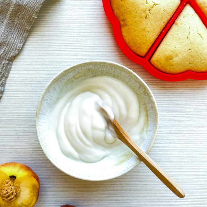 Honey yogurt topping being mixed in a small bowl..