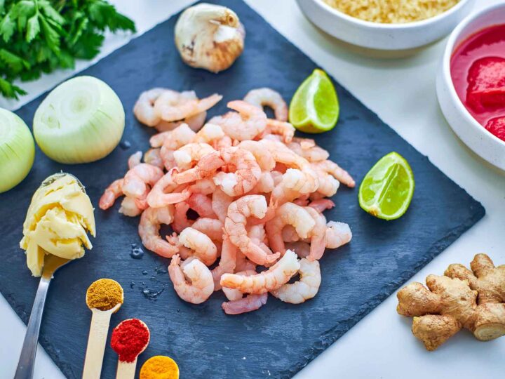 Fresh shrimp paired with garlic, ginger, spices, and lime create the flavorful base for a rich and aromatic dish.