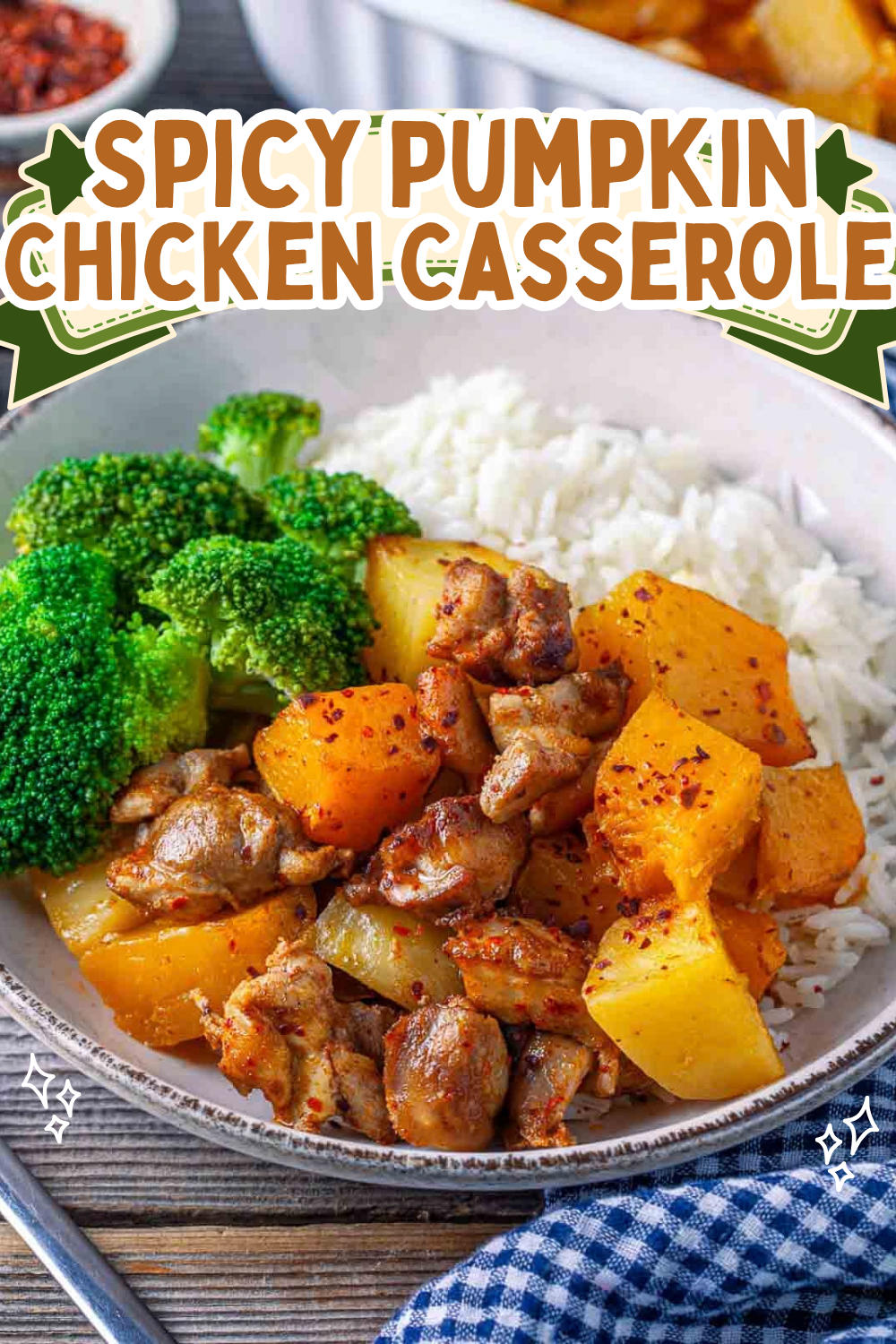 Spicy pumpkin chicken casserole with tender chicken, pumpkin chunks, broccoli, and white rice in a bowl.